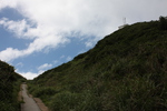 奄美大島の笠利岬の道と灯台（右上）
