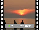 能登半島「千里浜海岸」の日没と光帯